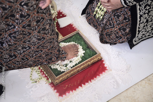 Quadro em tela Wijikan or ranupada, the procession of the bride washing the groom's feet