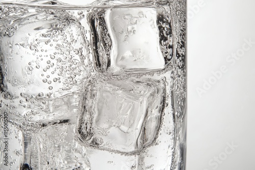 Close-up of sparkling water with ice cubes in a glass. (3)