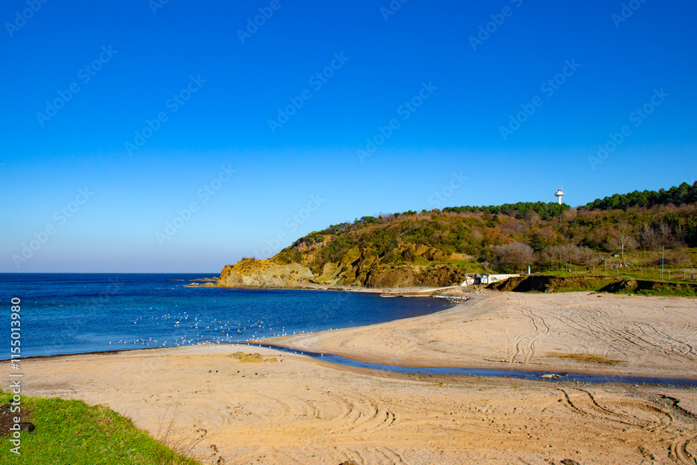 Panoramic nature landscape. Blue sky and sea, beach and hill view. a Deserted bay. Empty coastline. Peaceful, tranquil campsite idea concept. Panoramic nature landscape. Blue sky and sea, beach and hill view. a Deserted bay. Empty coastline. Peaceful, tranquil campsite idea concept.