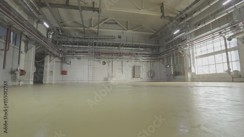 Empty production hall after renovation, from the inside. Large factory shop from the inside. 