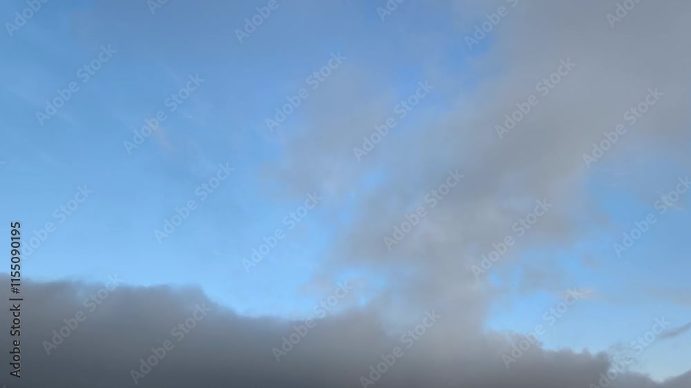 Orange cumulus clouds moving at dawn Orange cumulus clouds moving at dawn