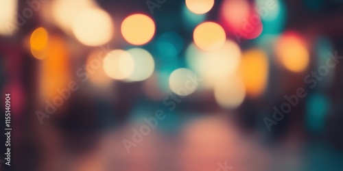 Blurred bright glowing lights of district in megapolis under dusk sky in evening on blurred background