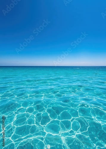 Tropical paradise, crystal clear turquoise water, rippling ocean surface, bright blue sky, horizon line, underwater sand patterns, sunlight reflections, Caribbean sea, tranquil seascape, summer vacati