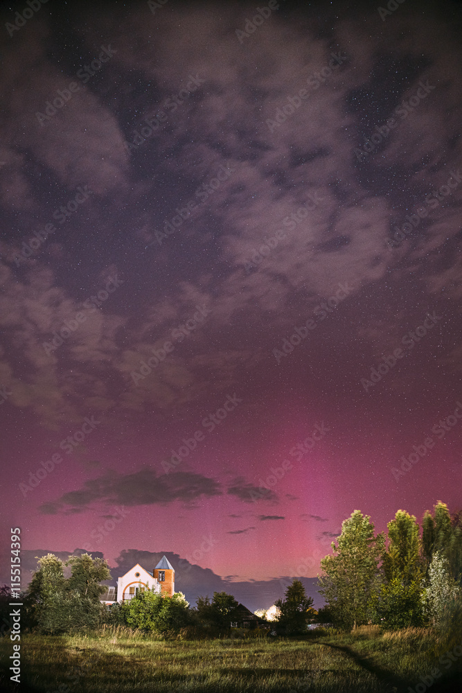 Aurora borealis Amazing Night Starry Sky above summer country landscape. Bright Dramatic Perseids meteors Trails Of Stars And Meteors. Sky In Different Colors. From Dusk Till Dawn. Misty Night.