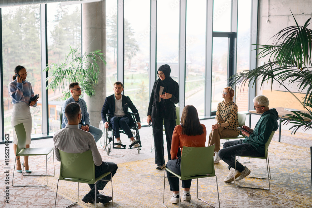 Obraz premium Corporate business team meeting with a manager or coach. Group of happy diverse, multiracial people sitting in a circle 