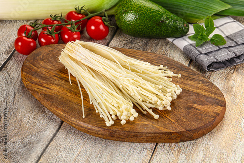 Raw enoki mushroom for cooking photo