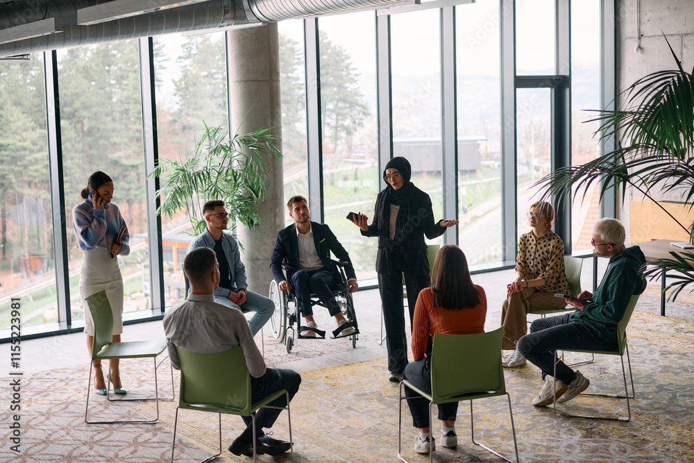 Obraz premium Corporate business team meeting with a manager or coach. Group of happy diverse, multiracial people sitting in a circle 