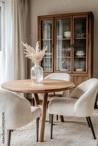 A beige sofa and chairs surrounding a light oak wooden table near a large window. Large living room decoration 