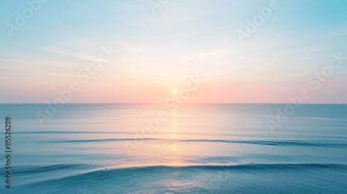 Calm ocean at sunrise with gentle waves under a pastel sky embracing the new day with tranquility photo