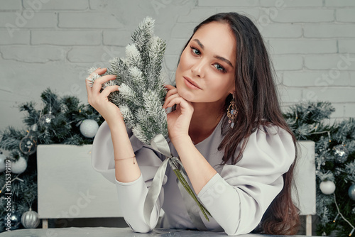 Elegant Woman Resting with Frosted Bouquet. photo