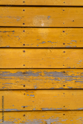 Damaged paint on painted boards as a background in graphics. photo