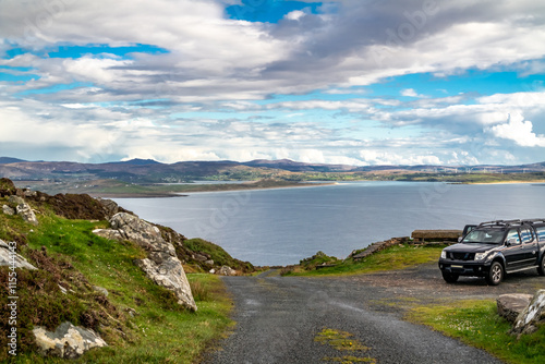 The coastal single track road between Meenacross and Crohy Head south of Dungloe, County Donegal - Ireland photo