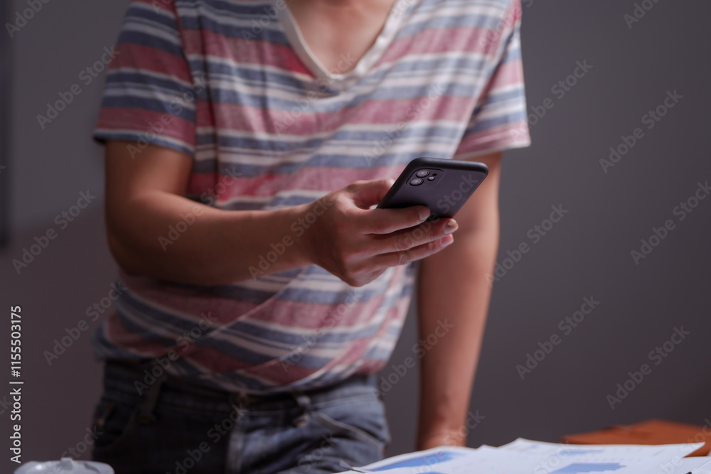 A man sits at his desk at home at night, working on his laptop. He views charts, checks documents, and analyzes financial data, focusing on investments, stock trading, and shareholder rights A man sits at his desk at home at night, working on his laptop. He views charts, checks documents, and analyzes financial data, focusing on investments, stock trading, and shareholder rights
