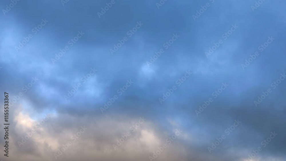 Film landscape of sky covered by orange and grey cloud mass at dawn Film landscape of sky covered by orange and grey cloud mass at dawn