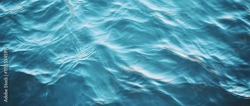 Transparent blue clear water surface texture with ripples, splashes and bubbles. Abstract summer banner background Water waves in sunlight with copy space Cosmetic moisturizer micellar toner emulsion