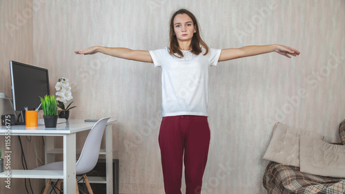 Young woman doing fitness exercise at home