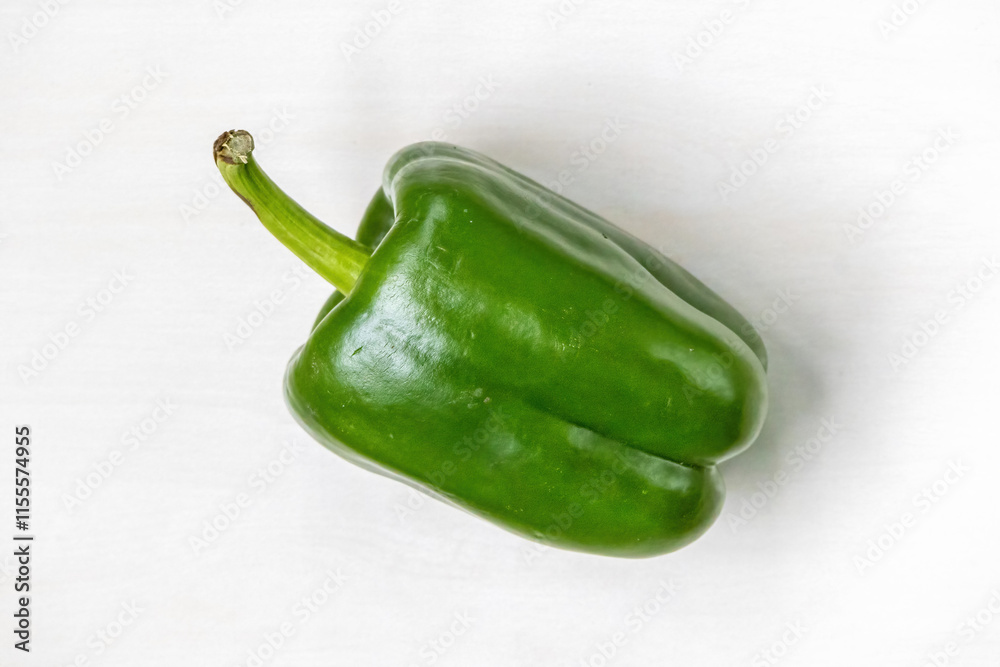 custom made wallpaper toronto digitalTop view of a fresh green bell pepper isolated on white background. It is also known as capsicum, sweet pepper, jalapeno, cayenne, paprika, or chili pepper.