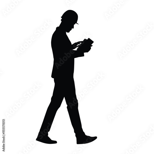 Silhouette of a person reading a book