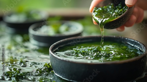 Refreshing green smoothie ingredients displayed on a wooden surface with kale...