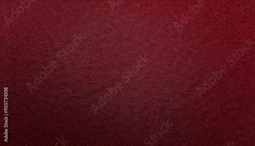 close-up of deep red velvet-finished paper with fine texture and smooth tactile surface
