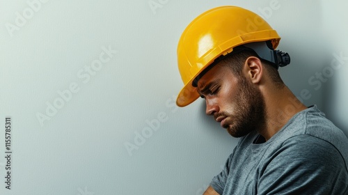 Wallpaper Mural Construction worker in yellow hard hat urban setting portrait emotional expression close-up photography Torontodigital.ca