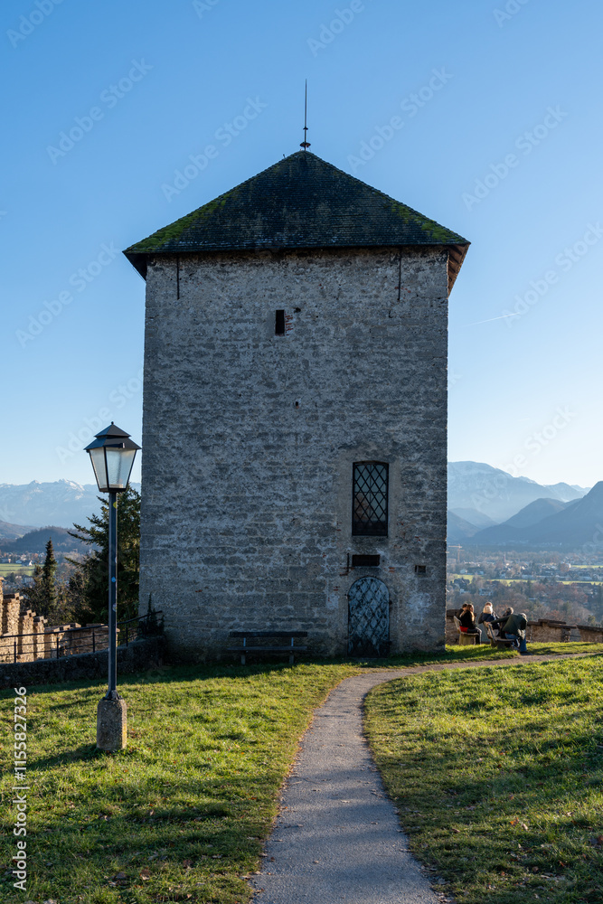 Fototapeta premium Buildings and castles in the fields around the Hohensalzburg fortress, Salzburg, Austria at the Monchsberg hiking trail