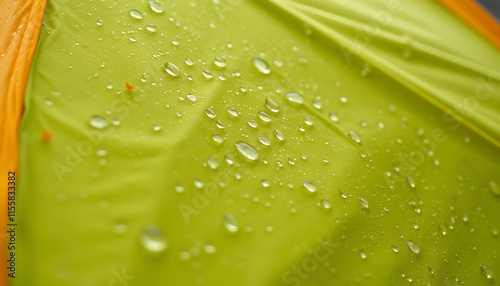 Macro shot of a tourist tent with raindrops on it, close up. Surface of camping tent made of waterproof material, equipment of good quality, tourism on a rainy weather concept, studio photography. i photo