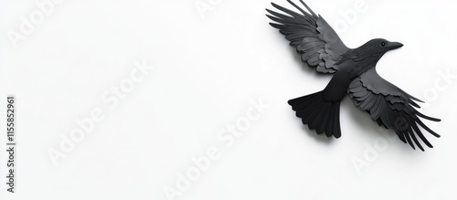 Black crow flying against a white background with ample copyspace for text and branding purposes photo