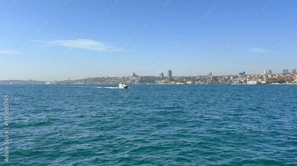 Istanbul Beyoğlu city skyline and Sea of Marmara with travel tour boat