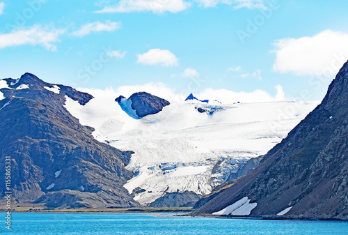 The magnificent scenery around Hercules Bay on  South Georgia Island features snow capped mountains and glaciers.South Georgia photo