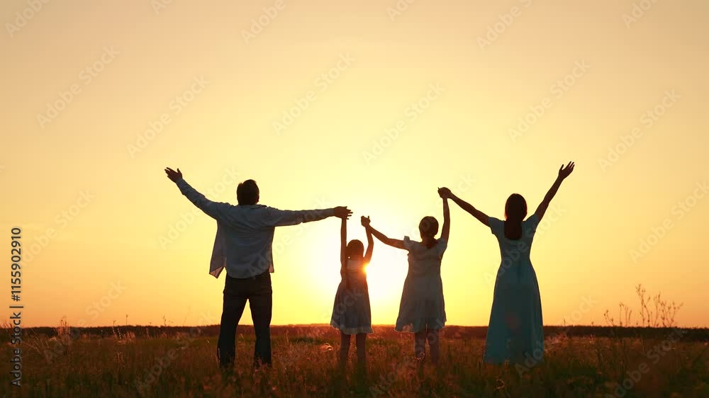 Mom dad child boy girl raise hands together at sunset in park. Slow motion. Family with children holding hands, meadow in sun. Mother father child praying to god, enjoying nature. Parents kids, nature Mom dad child boy girl raise hands together at sunset in park. Slow motion. Family with children holding hands, meadow in sun. Mother father child praying to god, enjoying nature. Parents kids, nature