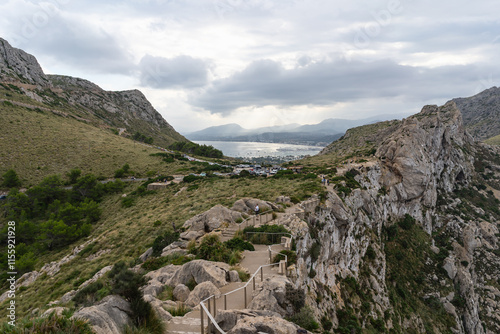 Cap de Formentor, Mallorca, Spain 25.10.2021 - Hiking trail with safety railings leading to Port de Pollenca bay overlook.