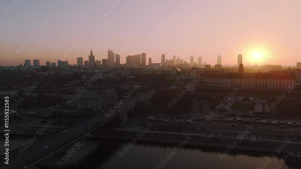 aerial flyover of vistula river with view of royal castle and panorama of warsaw in summer at sunset aerial flyover of vistula river with view of royal castle and panorama of warsaw in summer at sunset