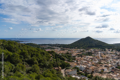 Capdepera, Mallorca, Spain 26.10.2021 Panoramic coastal view from castle hill showing Mediterranean town and sea with mountain backdrop