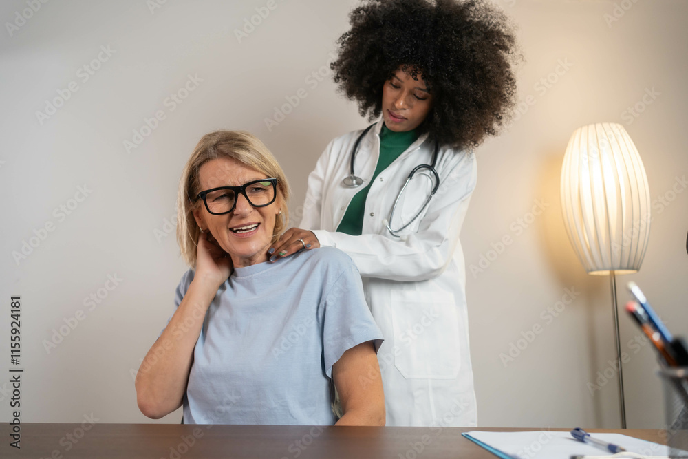 medicine, healthcare and people concept - female patient with pain in neck and female doctor at medical office in hospital
medicine, healthcare and people concept - female patient with pain in neck and female doctor at medical office in hospital