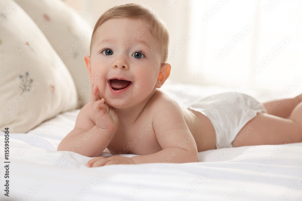 Cute little baby on bed at home Cute little baby on bed at home