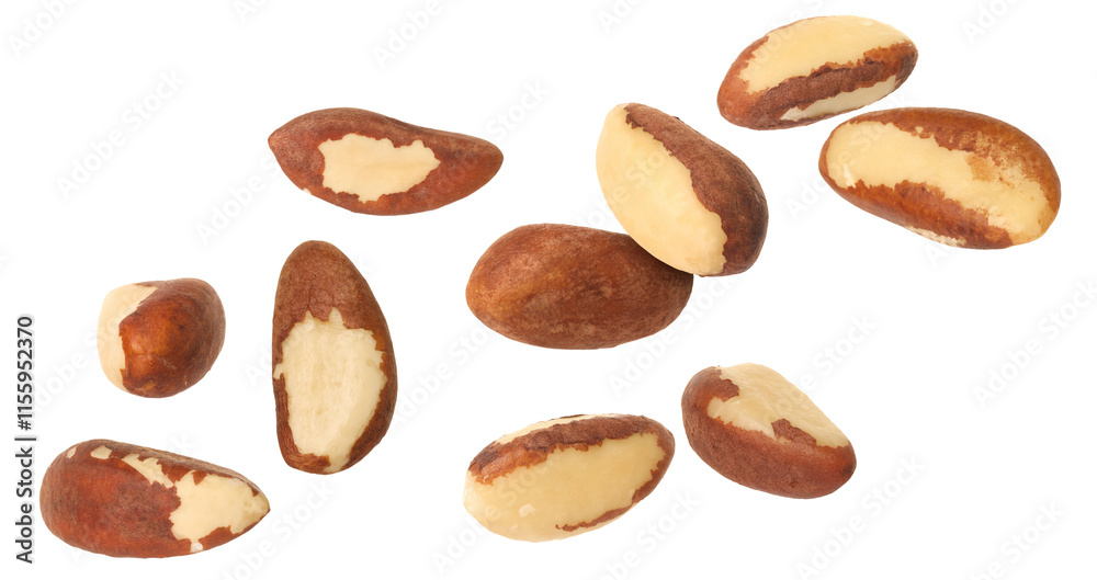 Many Brazil nuts in air on white background Many Brazil nuts in air on white background