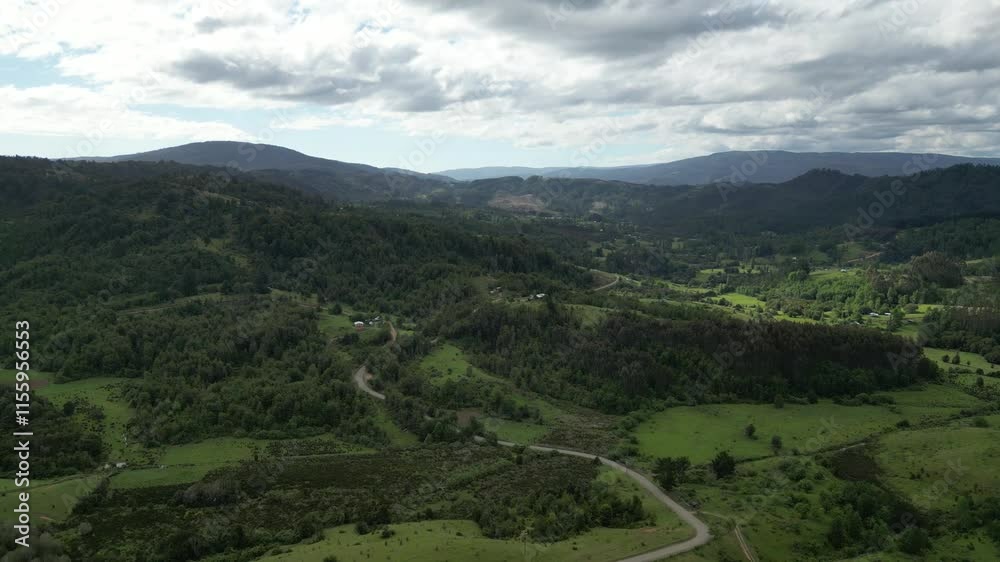 Aerial view of lush green fields and hills near Osorno, Chile Aerial view of lush green fields and hills near Osorno, Chile