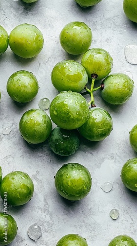 Fresh green grapes with water droplets on a light background for healthy eating