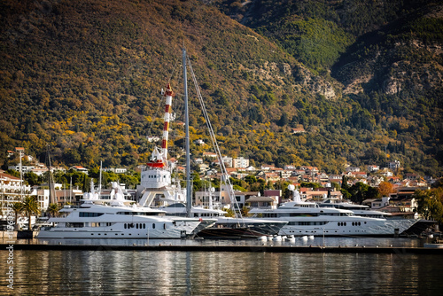 View of Tivat sea port bay from the water with ships photo