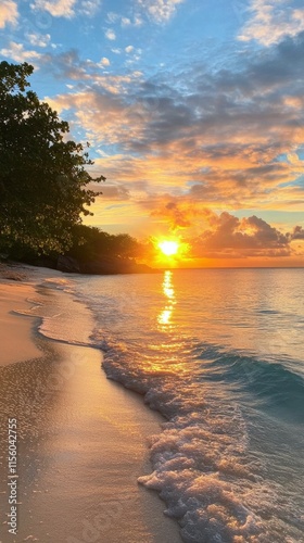 Sunset over calm waves at tropical beach with palm trees along serene shoreline