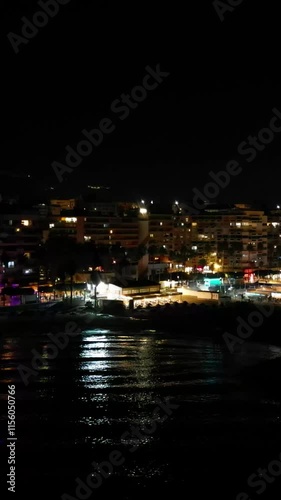 Wallpaper Mural marbella night flying over sea to reveal city skyline port harbor sparkling lights create magical atmosphere aerial drone shot revealing scenic views photography landscape urban  Torontodigital.ca