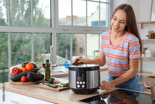 Young woman with multi cook...