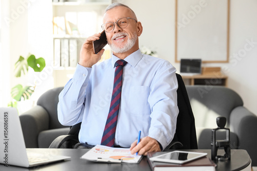Senior businessman talking ...