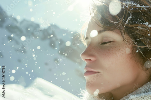 Peaceful woman with closed eyes enjoying the winter sun, surrounded by soft falling snowflakes and a serene snowy mountain landscape