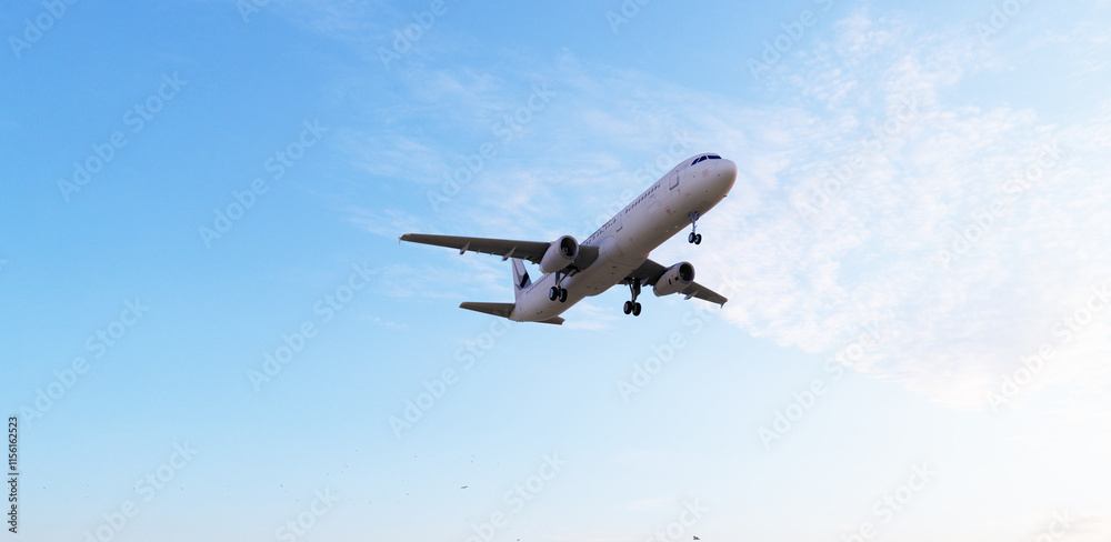 Fototapeta premium ULTRA HD. Airplane flies in blue sky. Travel, tourism. Airplane takes off against the background of blue sky. 