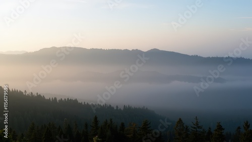 Misty Mountain Sunrise: Serene Landscape Panorama