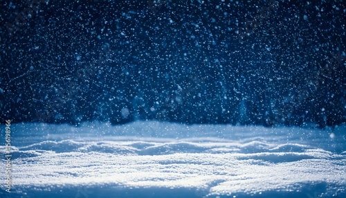 Obraz na płótnie snow falling on the ground at night w salonie