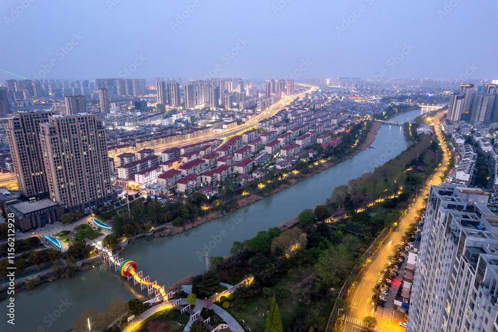 Fototapeta premium Aerial View of a Vibrant Urban Cityscape at Dusk