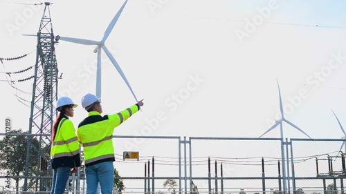 Wallpaper Mural Engineer and architect are working together to plan serious repairs to wind turbines to store backup energy. Torontodigital.ca